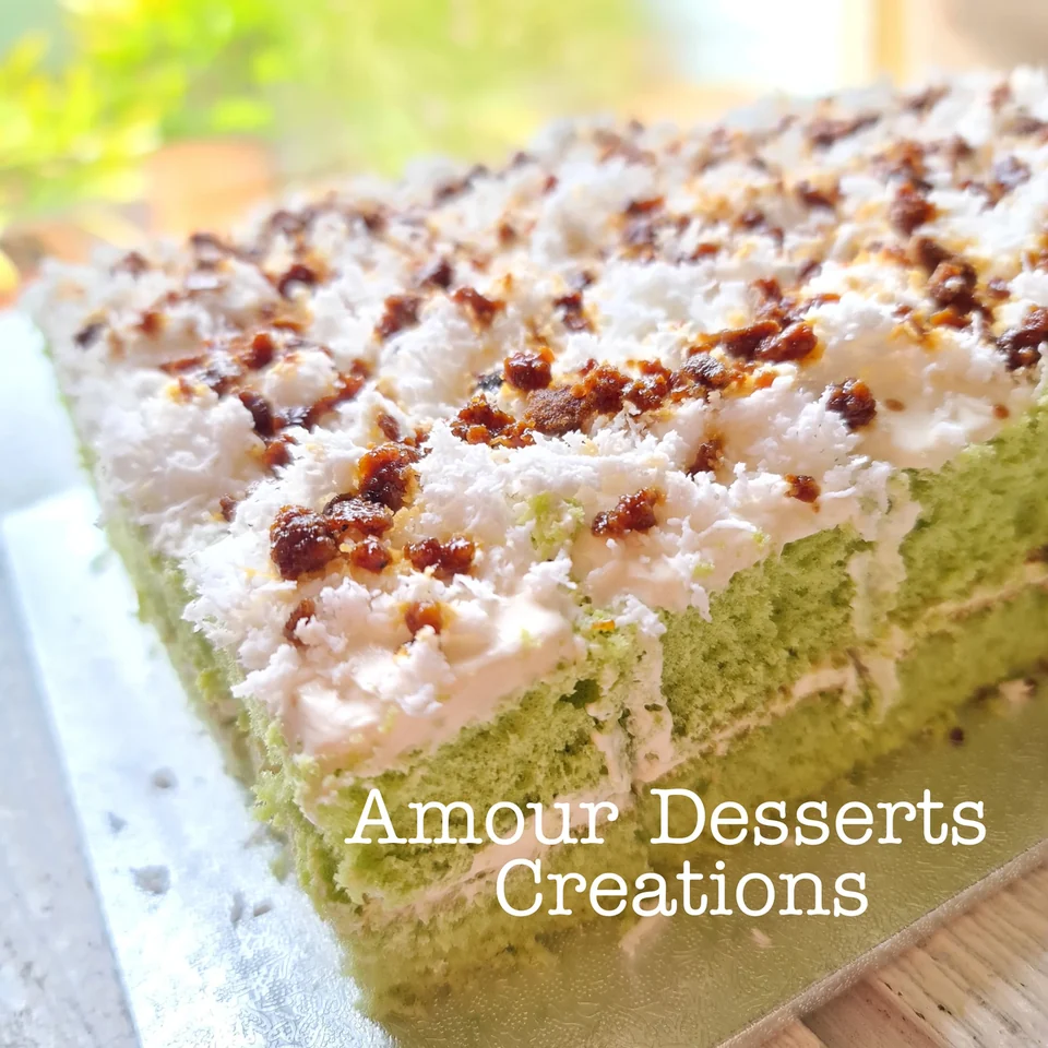 Pandan sponge celebration tea cake by Amour Desserts with gula melaka cream cheese and coconut topping