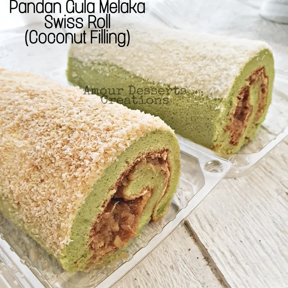 Pandan gula melaka Swiss roll by Amour Desserts with coconut filling and toasted coconut